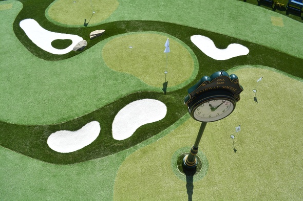 Edmonton Synthetic grass golf course with sand traps and golfers